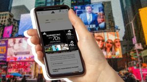 Drive to Store ad on mobile phone: Clearance sale, up to 70% off for Adidas.